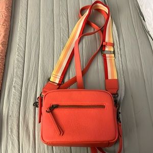 Cute peach colored over the shoulder bag